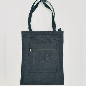 Plain black tote bag with front pocket
